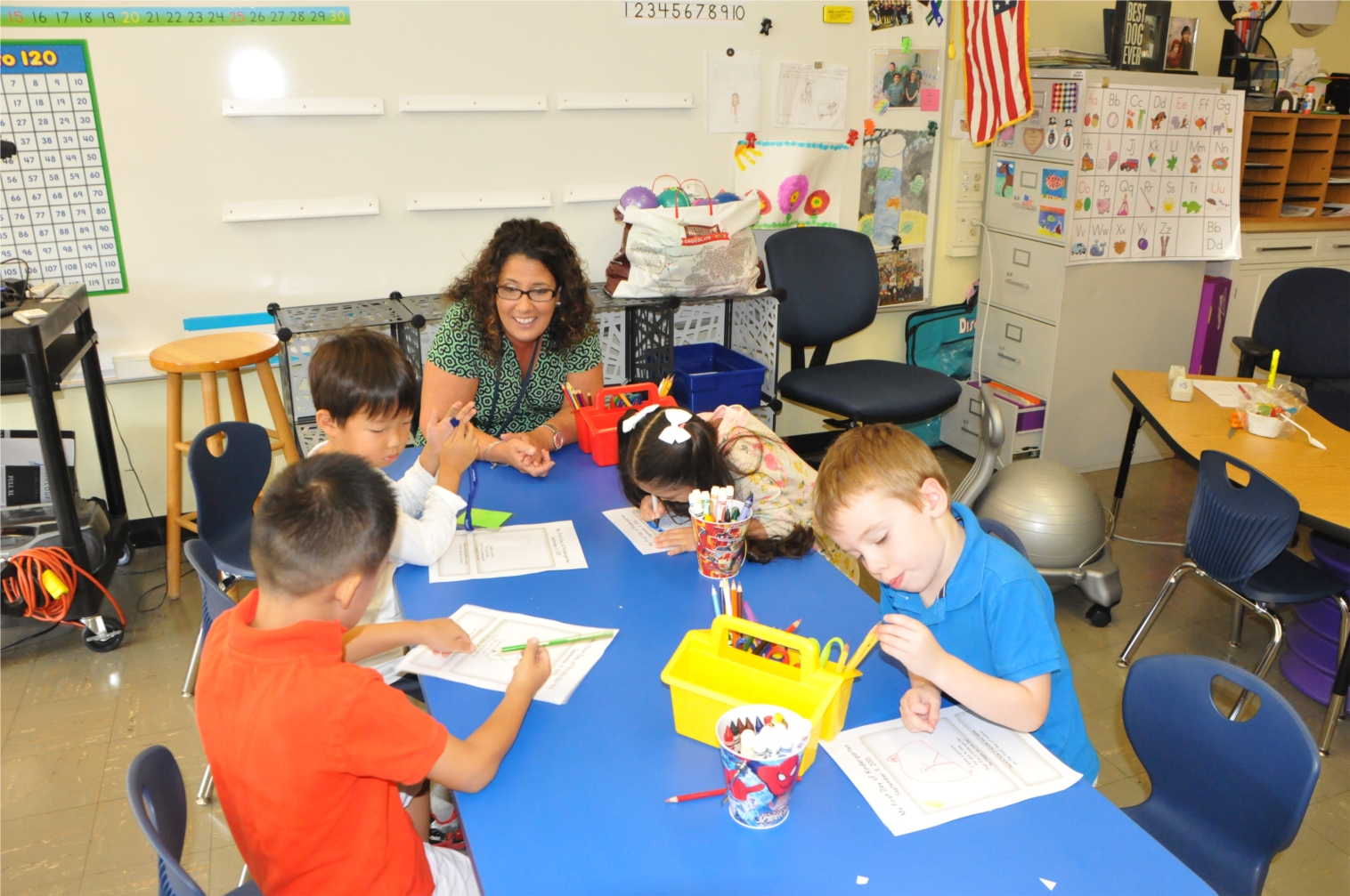 Assistant Superintendent Skeals works with students