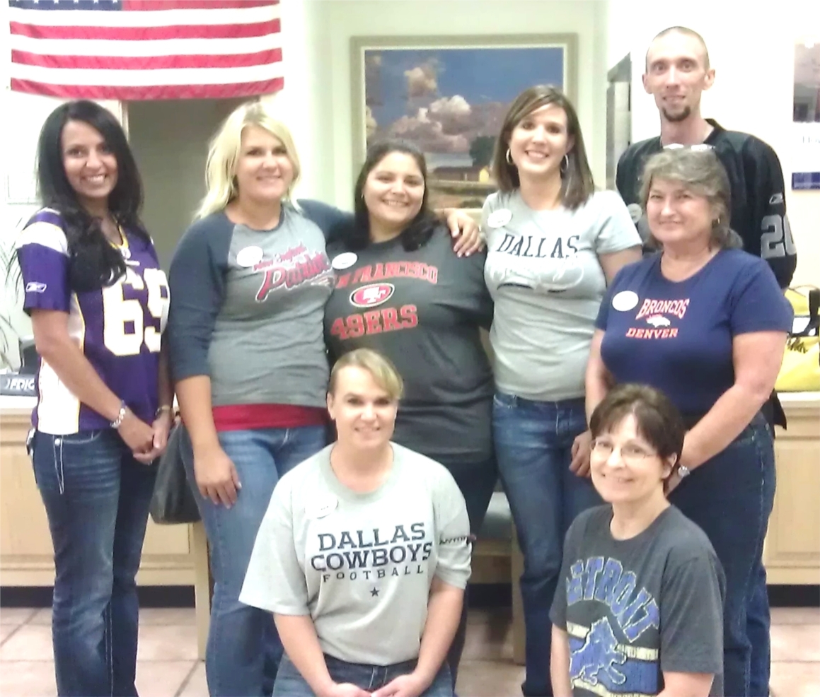Employees in the US Bank Los Lunas branch celebrating a "Friday Football Fun" event to get in the spirit to recognize their favorite teams along with our customers, 