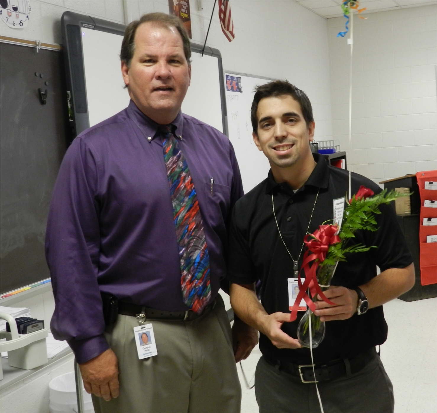 Douglas County Superintendent Dr. Gordon Pritz and 2014 Teacher of the Year Jason Backus of Alexander High School.