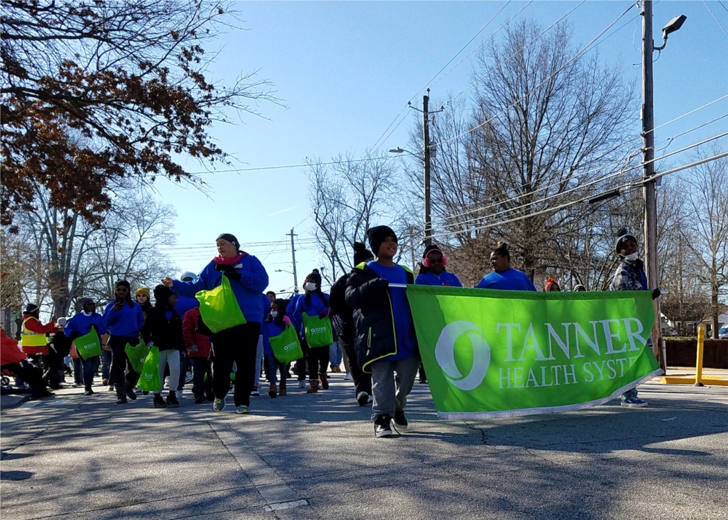 Tanner team members brave the frigid January weather to walk in Carrollton’s annual Martin Luther King Jr. Day parade.