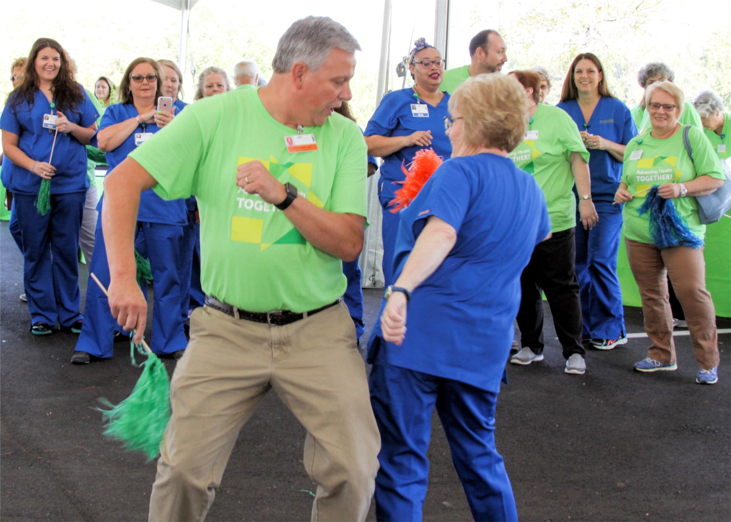 Ricky Daniel, FNP-C, a family nurse practitioner with Tanner Primary Care of Wedowee, and other team members celebrate at the open house for the fifth hospital in the Tanner system, Tanner Medical Center/East Alabama. The new hospital opened in November 2017.