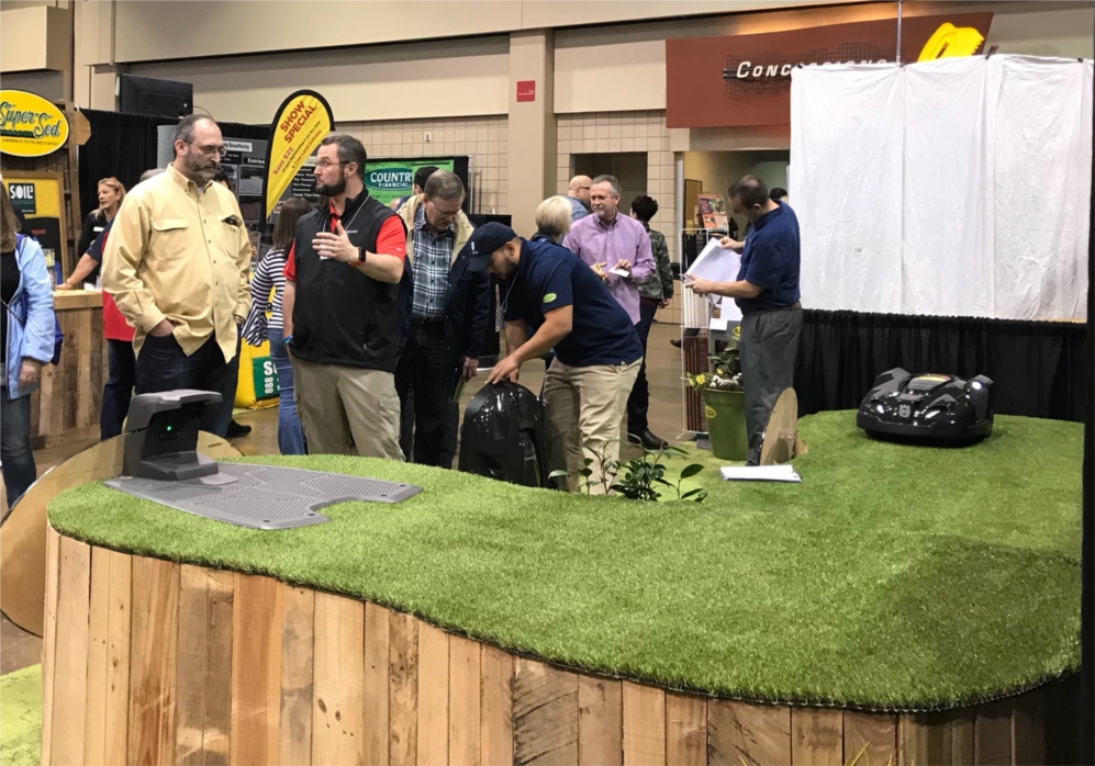 The Super-Sod crew has embraced the newest product rolled out over the past year - Husqvarna Automower robotic lawn mowers. Here team members explain Automower benefits to attendees of the North Atlanta Home Show.