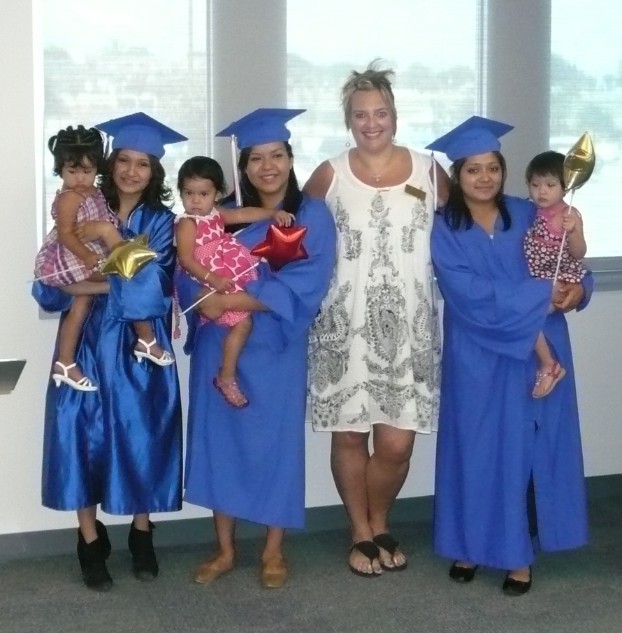 Three moms and their little ones graduate from the Any Baby Can Nurse-Family Partnership Program and pose with their nurse home visitor, Brooke Bajdek, who has worked intensively with these first time moms since early in their pregnancies.