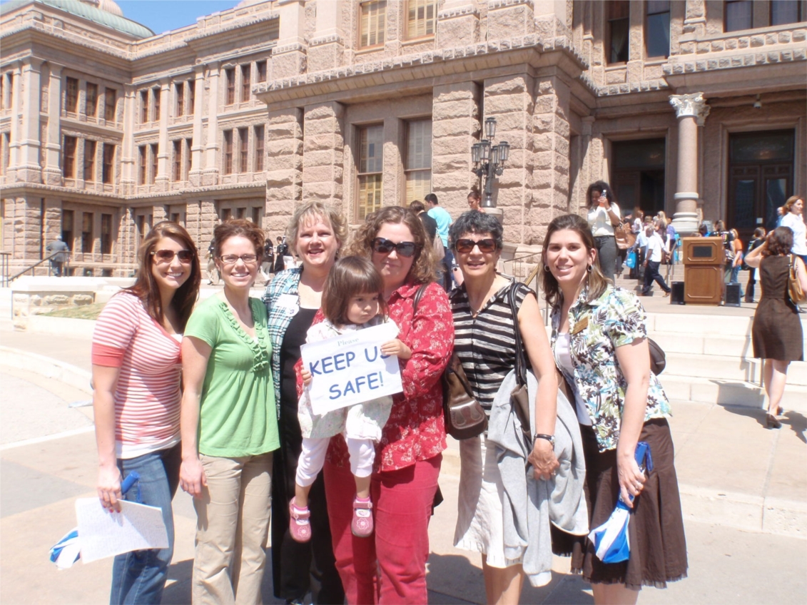 ABC staff join a rally at the Capitol to advocate for sustained funding of child abuse prevention work.