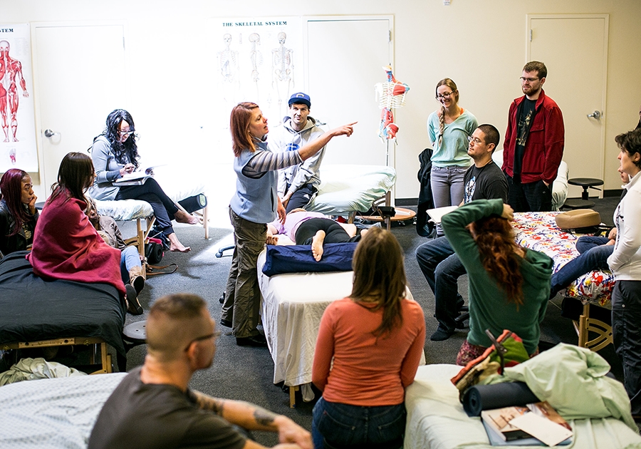 Assistant Program Manager, Kirsten Staley demonstrates techniques to students in the Advanced Neuromuscular Therapy Program