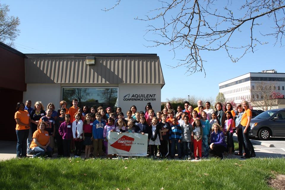 Aquilent employees share the day with their children during the annual Bring Your Sons and Daughters to Work Day.