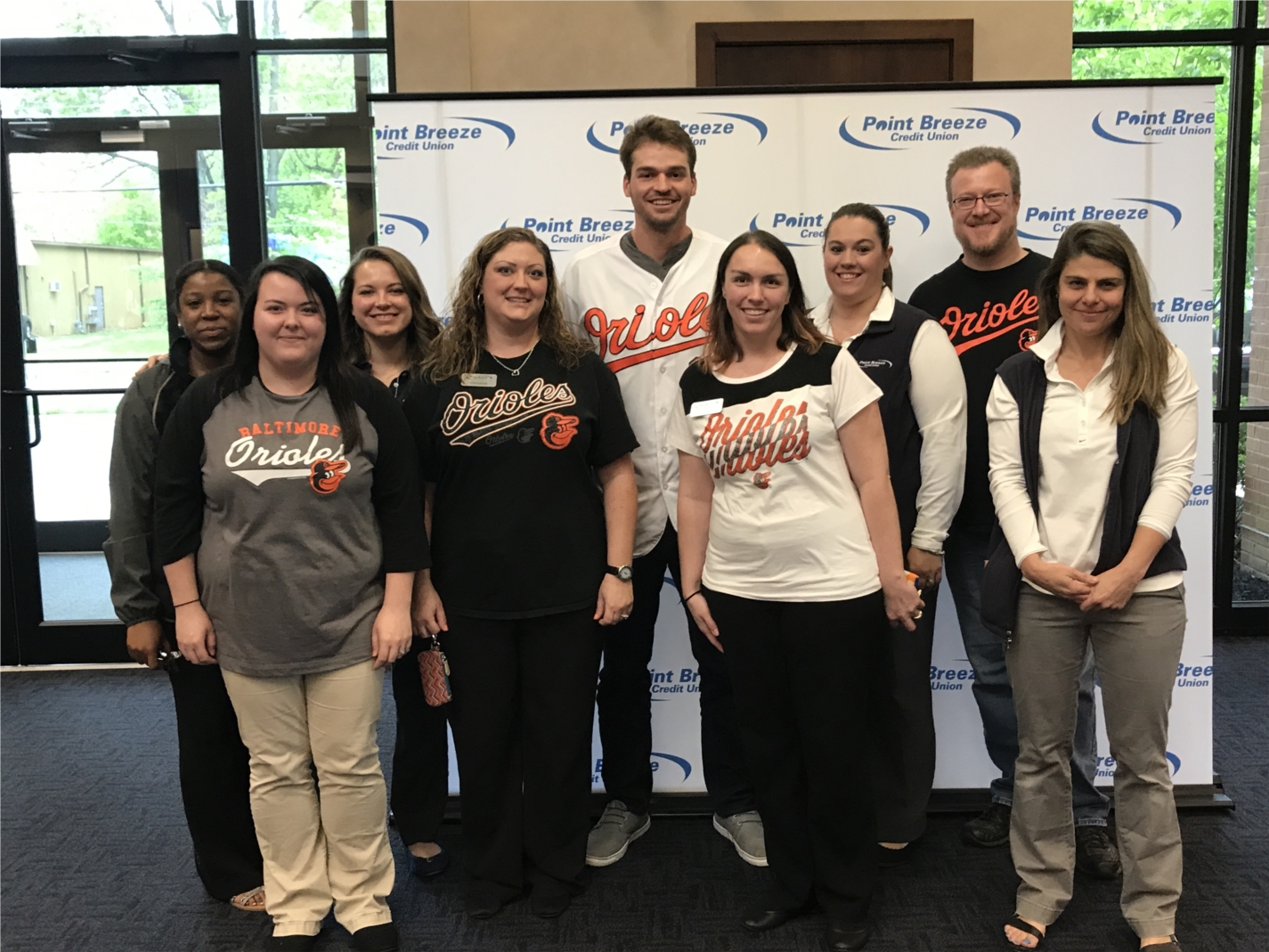 Orioles Outfielder Trey Mancini greets employees and members and signs autographs at Point Breeze Credit Union in Bel Air.