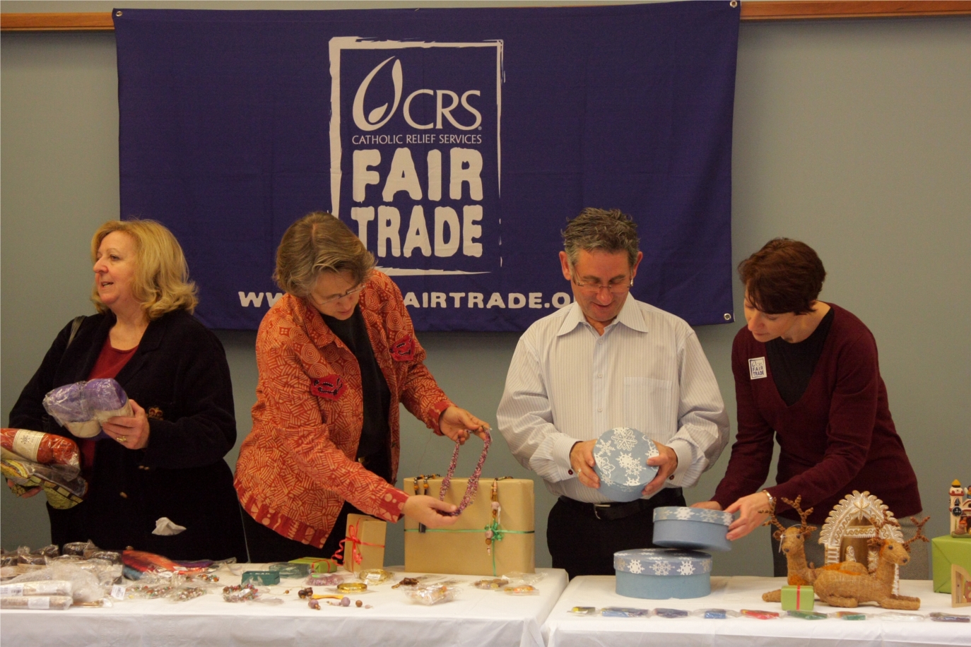 Catholic Relief Services staff prepare for the annual Fair Trade Holiday Sale.  Photo credit: Jim Stipe/CRS