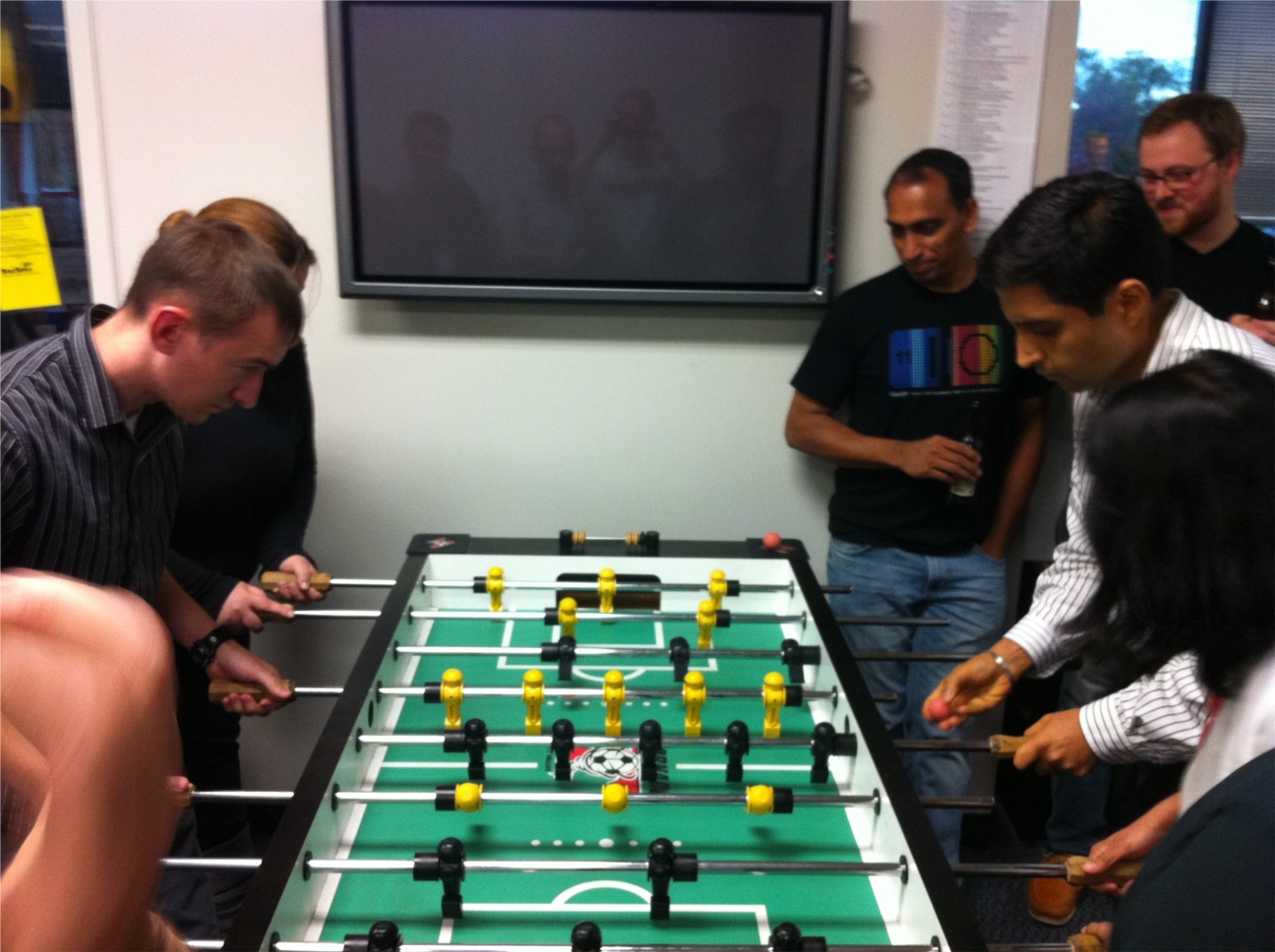 The engineering team gathers together for BoxTone's semiannual foosball tournament.
