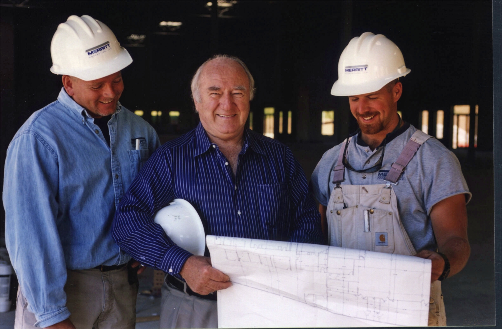 Merritt's founder, Leroy Merritt pictured on a job site with Merritt employees, Gordon Holland and Bryan Cornell.