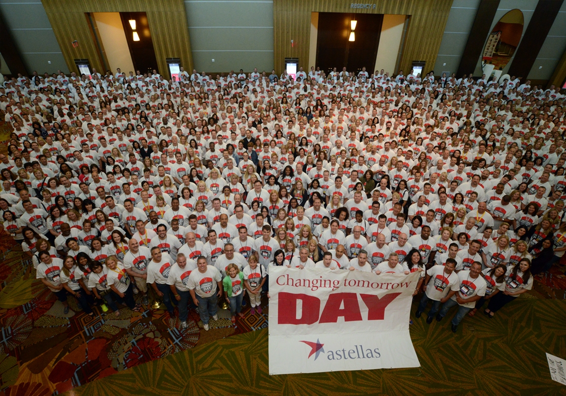 A group photo of Astellas Employees at our National Sales Forum this past June after assembling 1,800 care packages for A Veterans Community, a nonprofit organization to provide safe, stable housing for homeless veterans and their families.