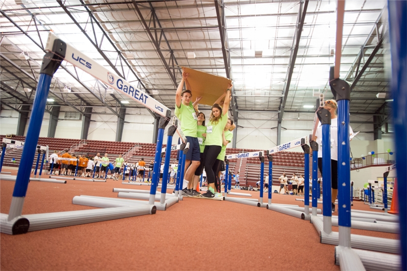 One of the many Cohen & Company teams working together in hopes of a win during the firm's full-day, Olympic-style teambuilding event.