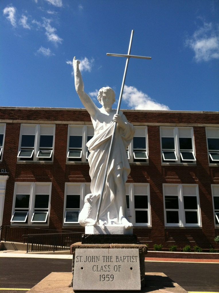 Front of Saint John School at 7911 Depot Road. Statue donated by Class of 1957.