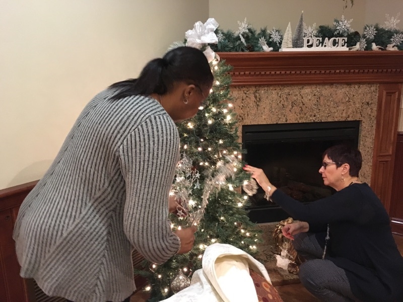 Employees from our Cleveland office help to decorate the Cornerstone of Hope for the holidays.