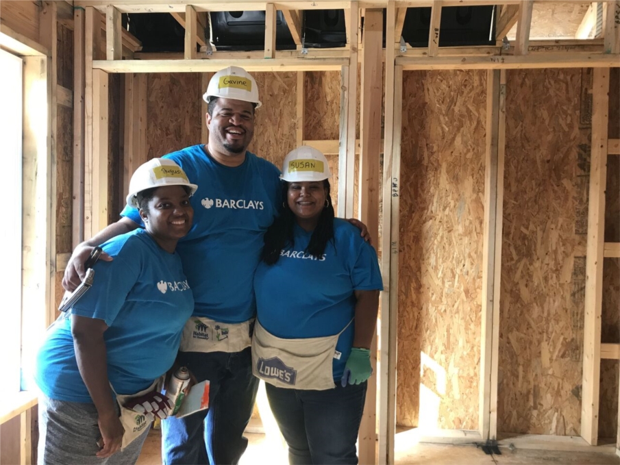 ‘Active in Our Community – Over 110 Volunteer Events Supported in 2017 – Shown Here: Habitat for Humanity