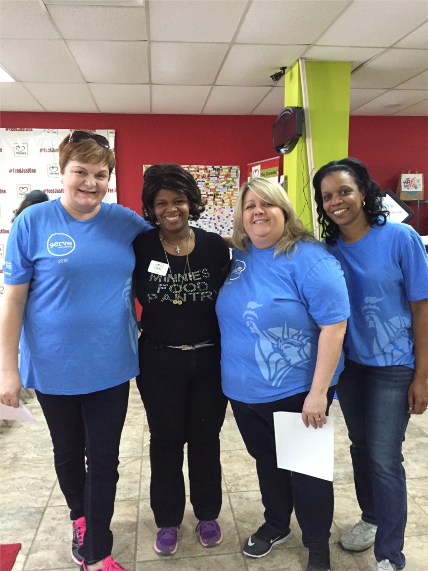 Liberty employees participating in annual Serve with Liberty community service day at Minnie’s Food Pantry in Plano