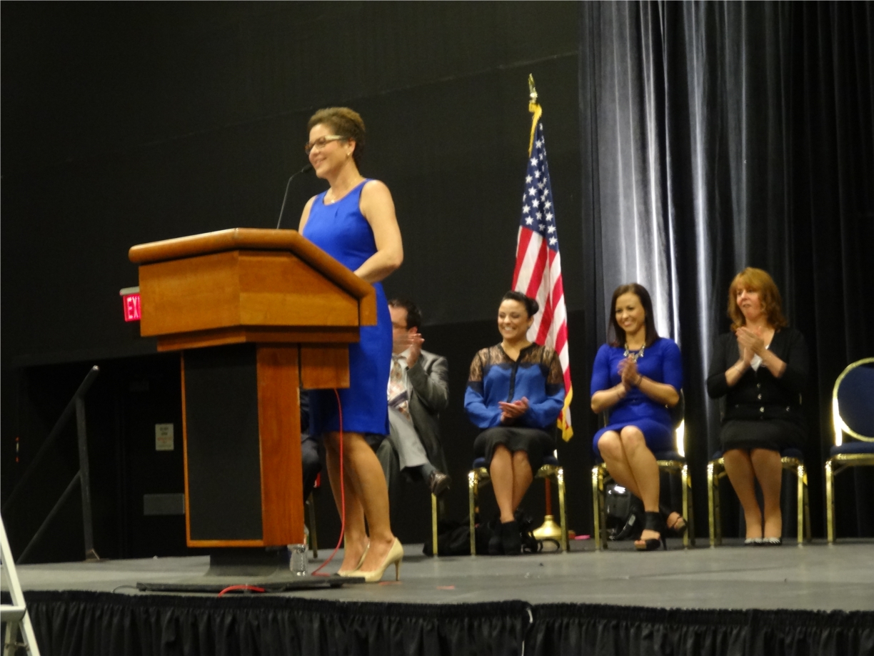 President and CEO Cheryl Zapata speaking at our 2014 Graduation