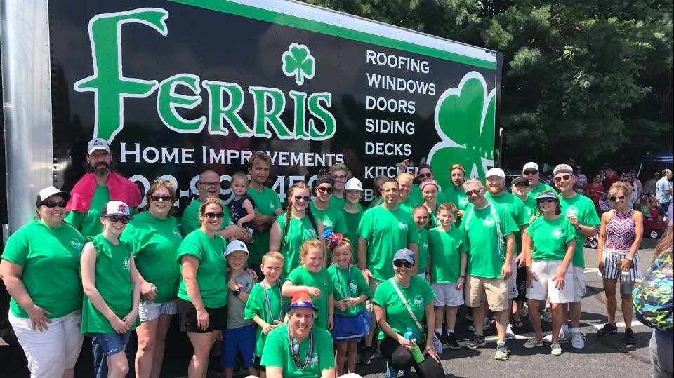 The Ferris Home Improvements team celebrating July 4th together by marching in the Hockessin 4th parade 2018.