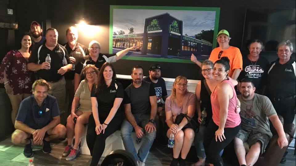 The Bath & Kitchen team enjoying a night at the ballpark at the newly renovated Ferris Home Improvements Blue Rocks suite. The company offers first come first serve to any game in the suite for its employees. 