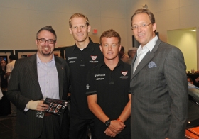 Porsche of Delaware Sales Manager, Alex Witham with Porsche Flying Lizard team members Jörg Bergmeister and Peter Long along with Winner Automotive Group President, Michael Hynansky.