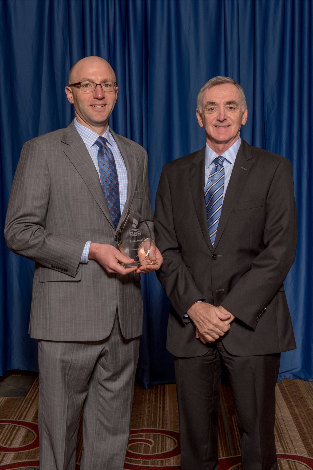 David Leto / Austin Palmer receiving the 2016 BBB Torch Award.