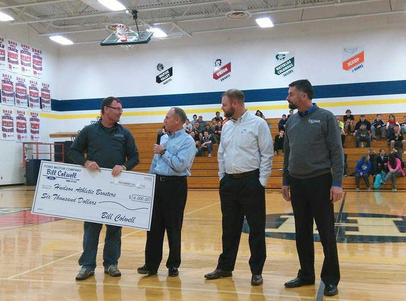 Bill Colwell Ford presenting $6,000 to the Hudson Athletic Booster Club this past fall. So far, Bill Colwell Ford has raised over $45,000 for the organization through their annual Drive 4 UR School event. 
