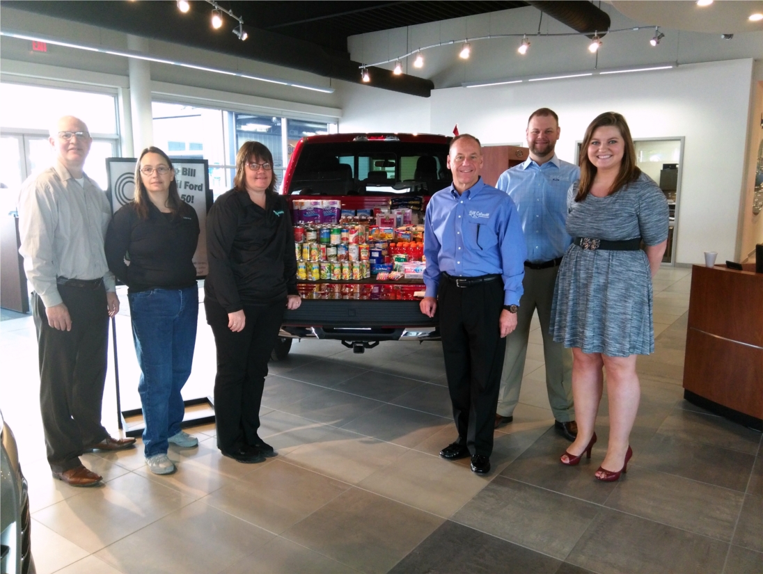Bill Colwell Ford donating the 548 items they were able to collect for the North East Iowa Food Bank. All the items together weighed 654 pounds, which is equivalent to 545 meals! 
