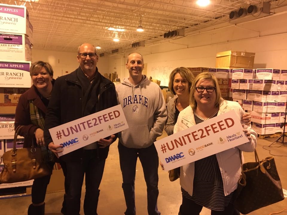 Coldwell Banker Mid-America Group, REALTORS staff and agents volunteered at an area food bank.  