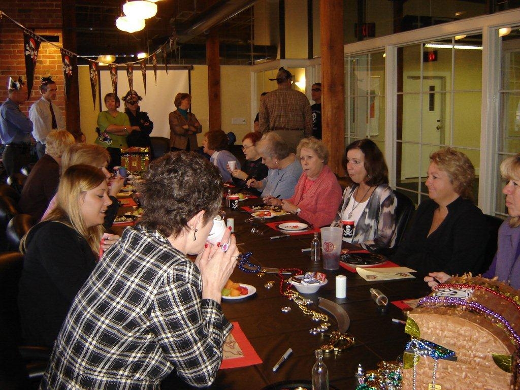 At the annual staff appreciation breakfast the attorneys open a themed restaurant and serve breakfast to the staff, some of it they cook themselves, and present the staff with a gift at the end of service