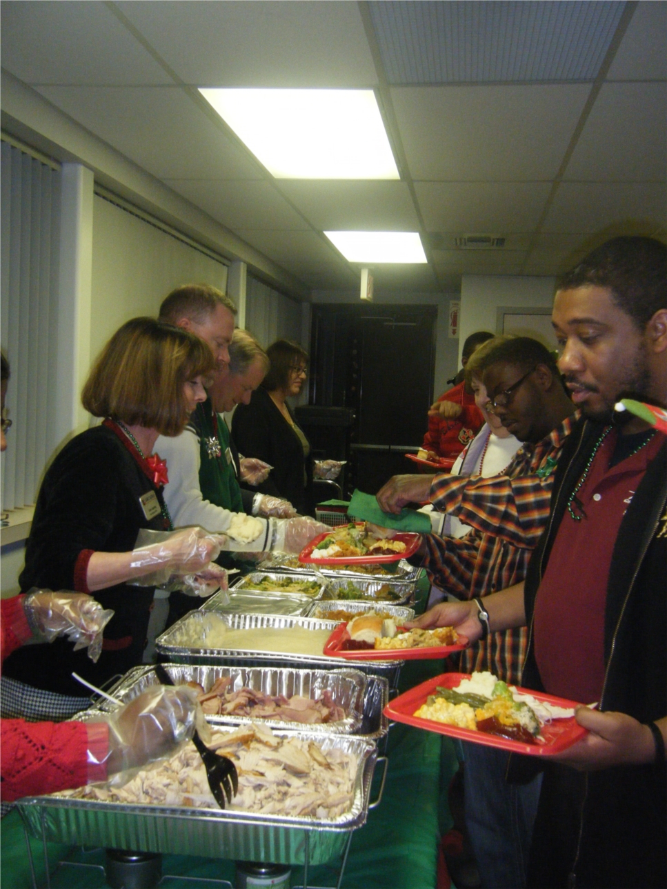 Arcadia provided a holiday dinner for the residents of The Judson's Center eight adult group homes.  Ham and turkey with all the fixings (plus dessert = yum) were served by our senior management team.  Santa made a visit to deliver gifts to all the residents.