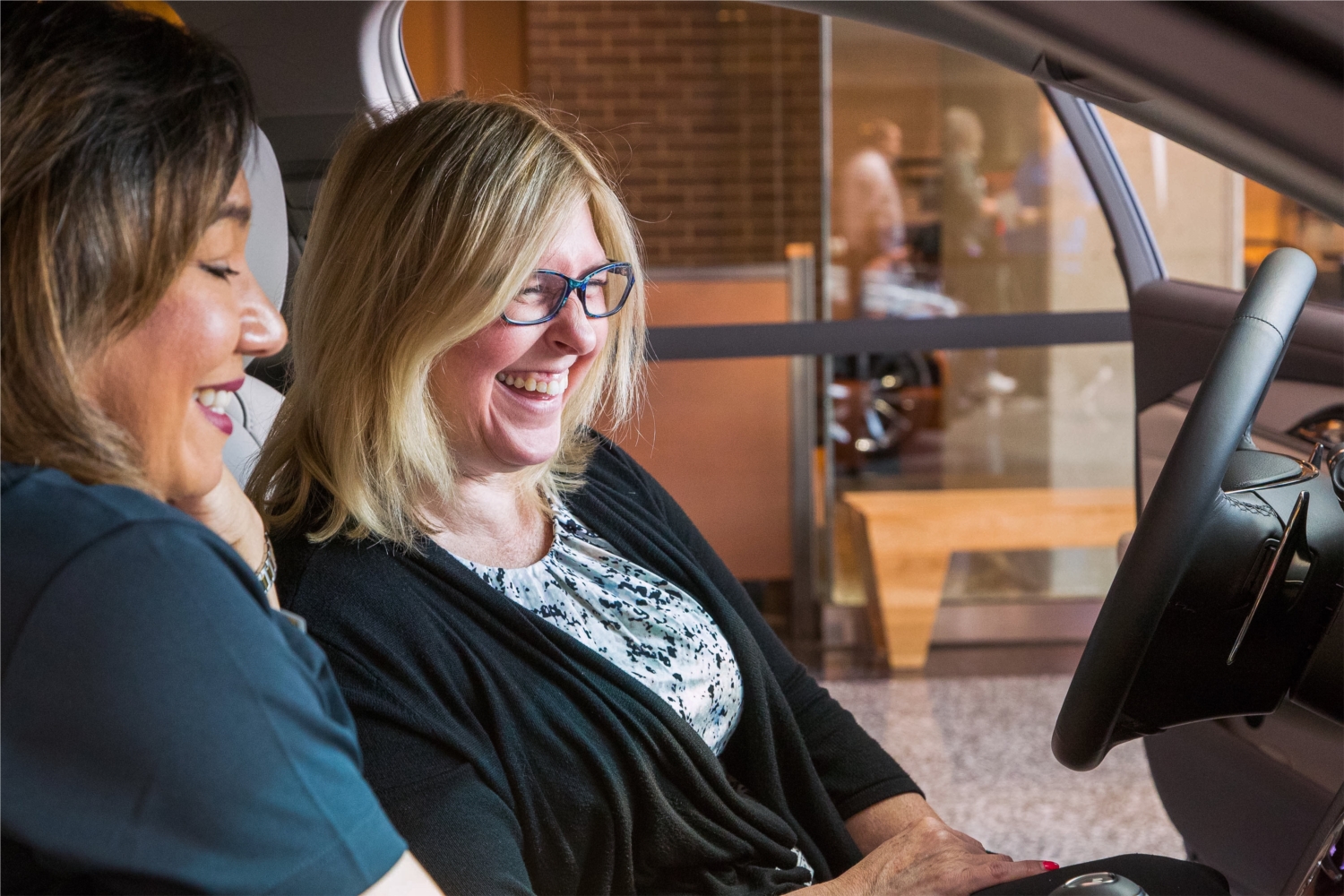 General Motors employees discuss in-vehicle connectivity technologies, including GM OnStar, that can help drivers be safer on the road. This was part of GM’s Safety Fair on August 30, 2017 during the company’s Global Safety Week at GM Global Headquarters in the Renaissance Center (Photo by Jeffrey Sauger for GM).