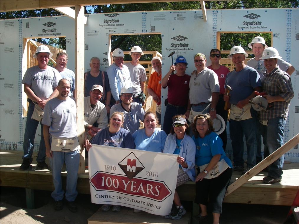 Employees participated in Habitat for Humanity home build in Madison Heights in 2010 in celebration of 100 years of service.