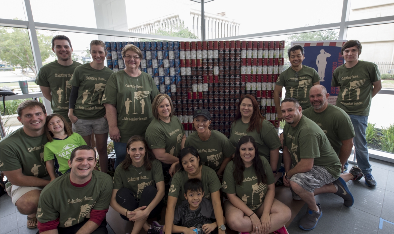 Hanover Helping Hands and their 2016 CANstruction sculpture, "Saluting Those Who Combat Hunger"