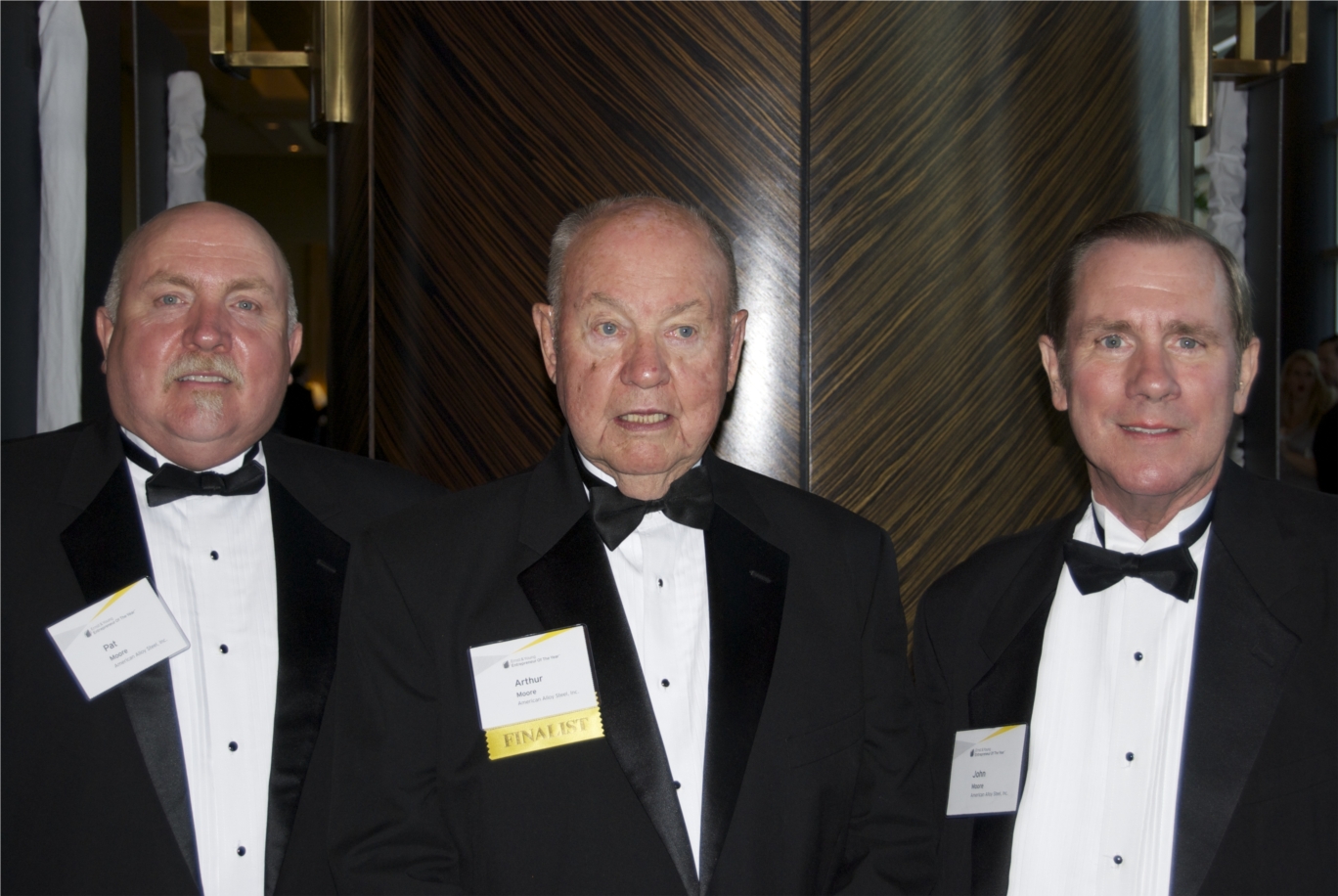 Pat Moore, Art Moore and John Moore at the Entrepreneur of the Year Ceremony 2013 Gulf Coast Area honoring Art Moore