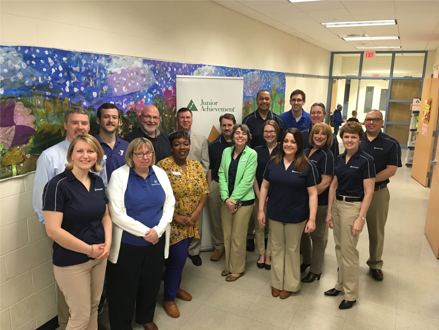 Simsbury Bank employees join with other local companies to teach the "JA in a Day" program to all students at Tariffville Elementary School in April 2018.  