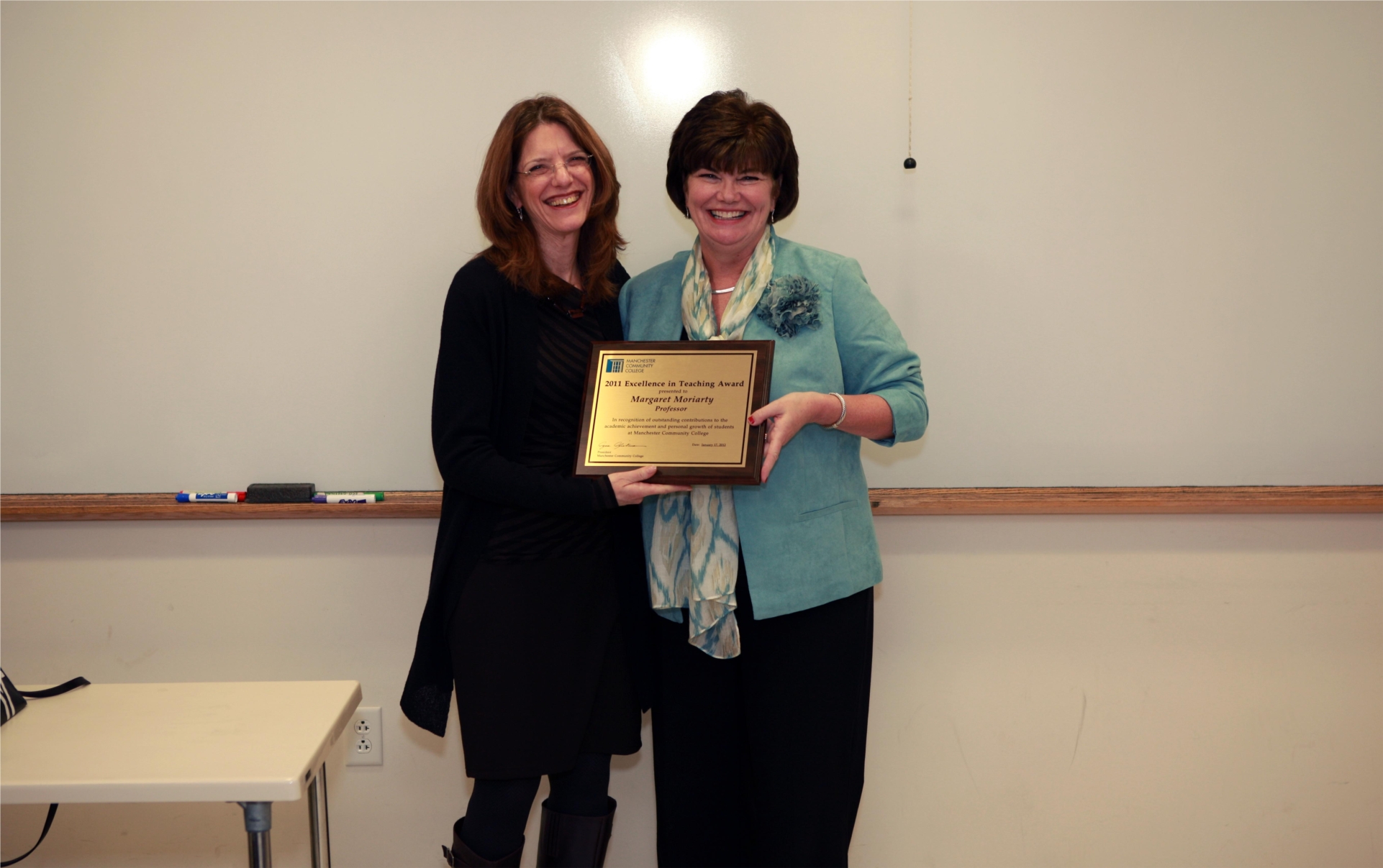 President Glickman presenting Excellence in Teaching Award (fall 2011).