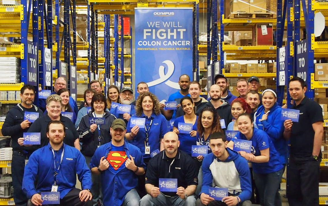 Employees at Olympus' Breinigsville distribution center show off their “blue” in support of the Colon Cancer Alliance's National “Dress in Blue” Day.