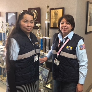 Olga Quezada, Driver & Sonia Campos, Driver Assistant  kept two young students calm during a nor’easter when their bus was stuck in traffic for 4 hours  by playing kid songs on CD player and let the students face time with their parents.  