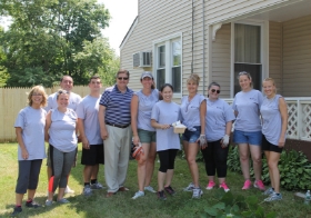 CMM Cares volunteers take a break while volunteering with United Veterans Beacon House.