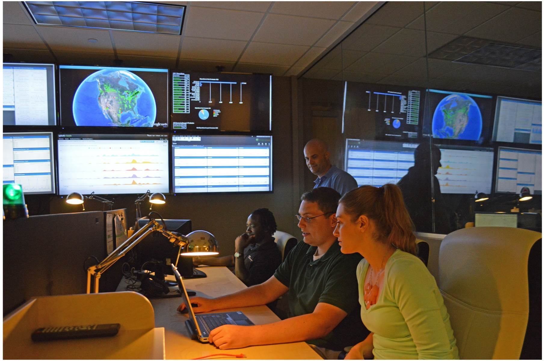 A view from inside the Network Operations Center. Real-time monitoring tools ensure reliable system performance.