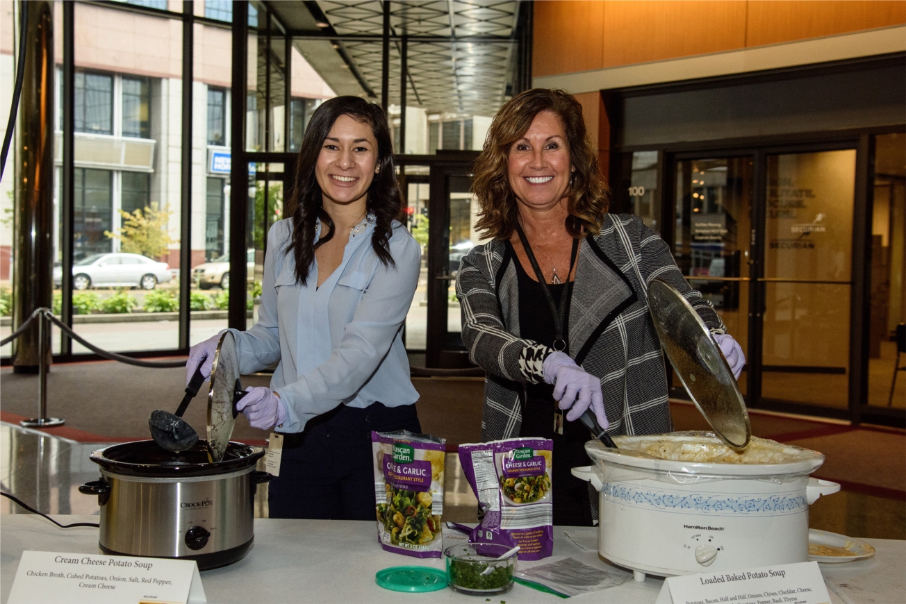 Associates serve soup at Crocktoberfest 2016, just one of many fundraisers for the United Way.  In 2016, Securian and our associates earned over $1 million dollars for the United Way.