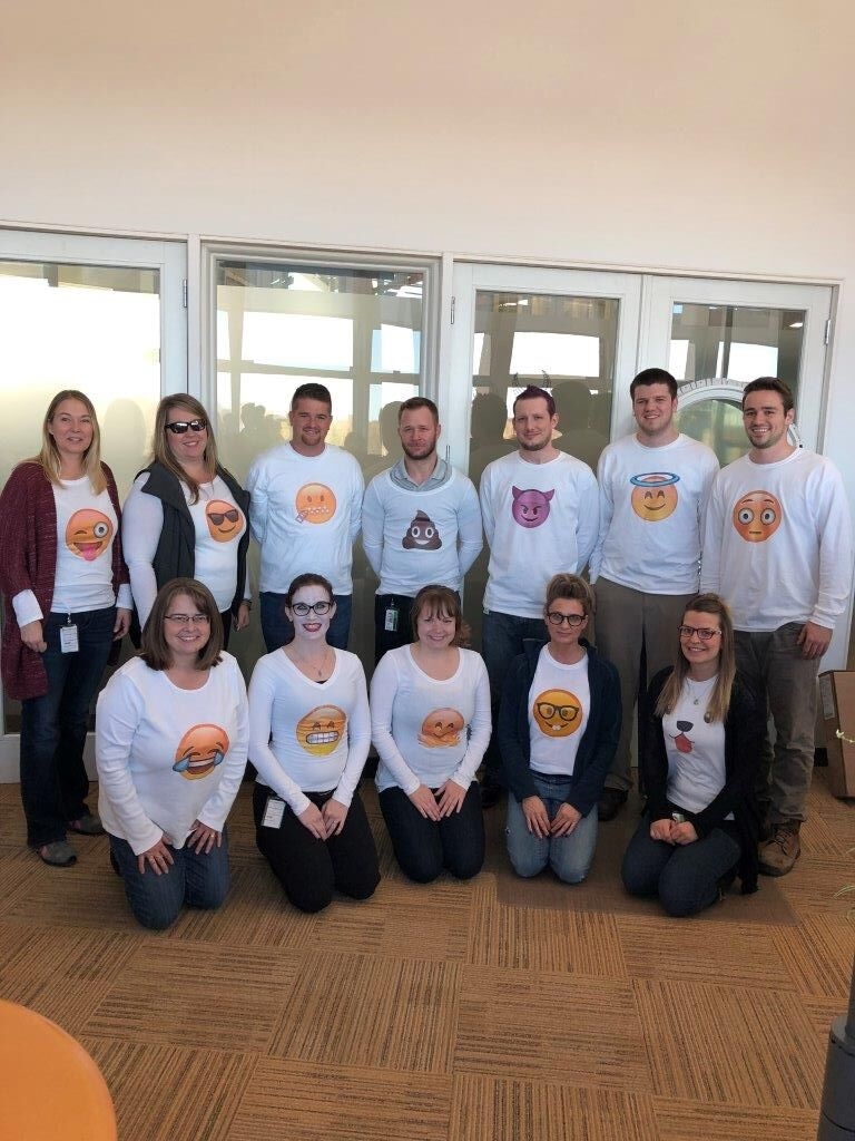 Supply Chain team dressed as emojis for Halloween!