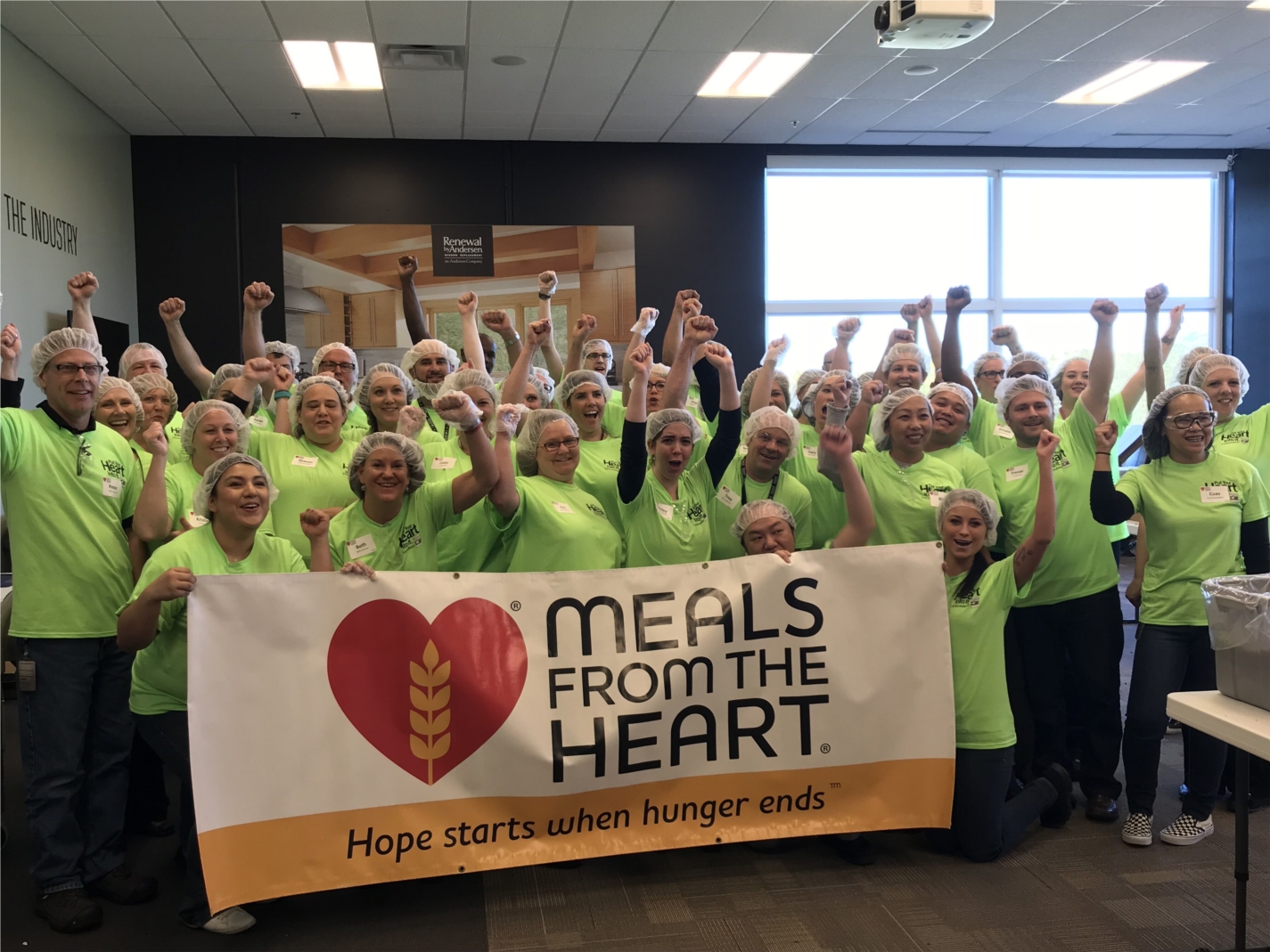 Meal packing onsite at our Cottage Grove location for Meals from the Heart. 
