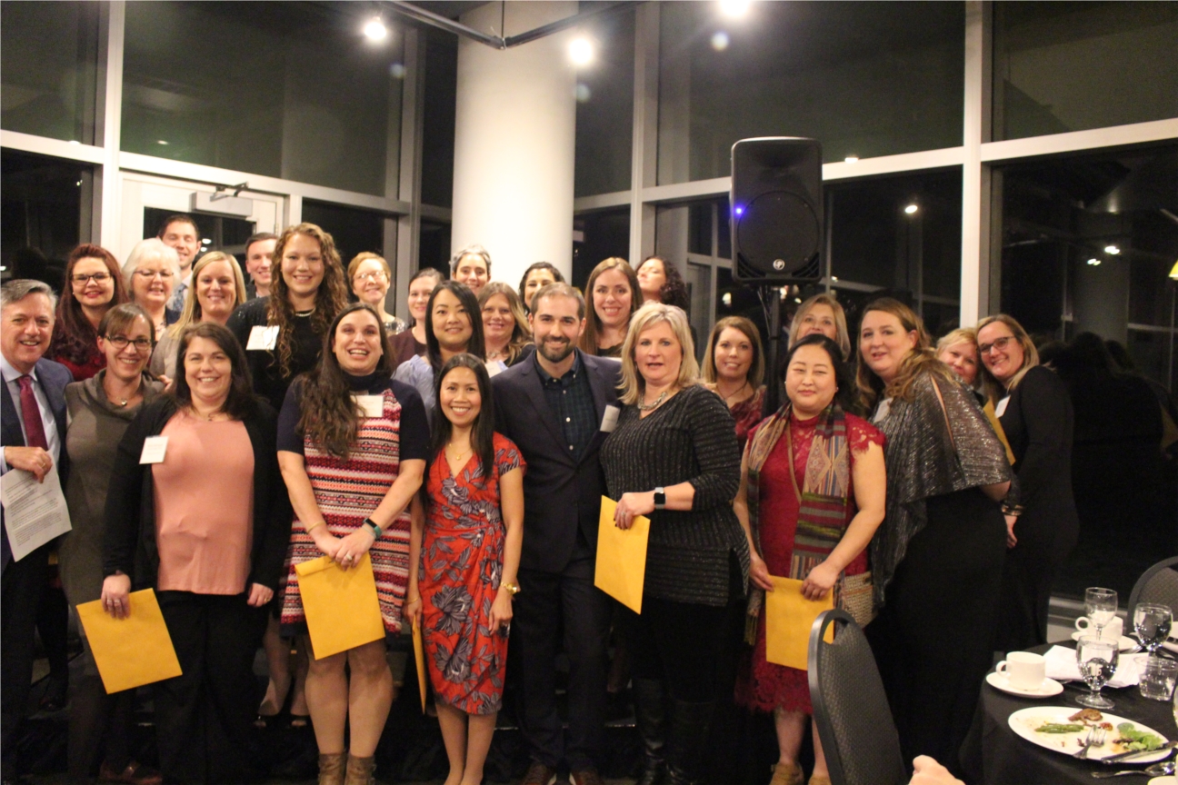 Celebrating our milestone anniversary awardees at our annual holiday party.