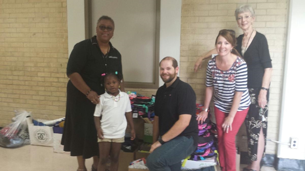 Baker Donelson employees donated thousands of dollars-worth of school supplies to the children of Whitney Elementary in Frayser.