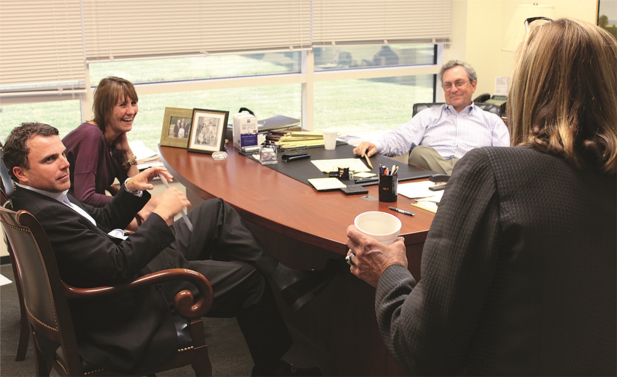 From left to right: William Tayloe, Susan Yount and Kent Wunderlich meet with Ruth Carr