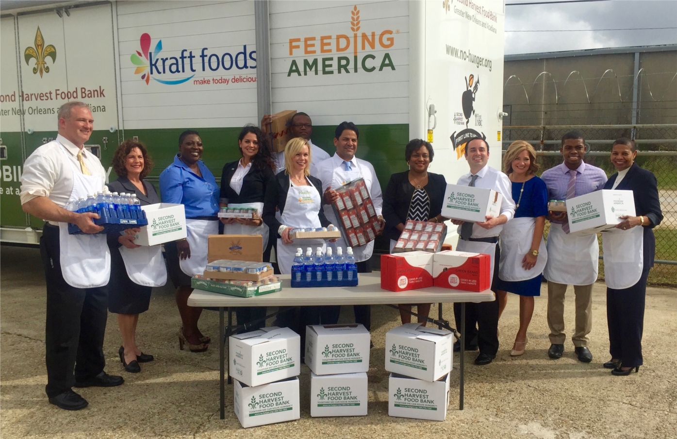 First NBC Bank employees working in the community with Second Harvest Food Bank