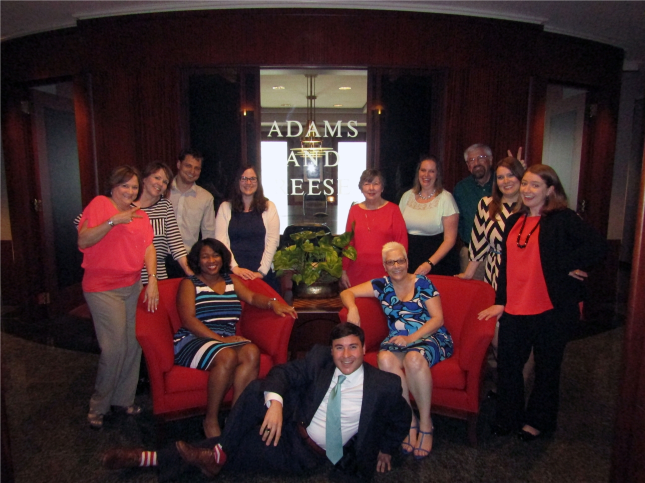 A group of Adams and Reese staff members gets silly in the firm's One Shell Square offices in downtown New Orleans. 