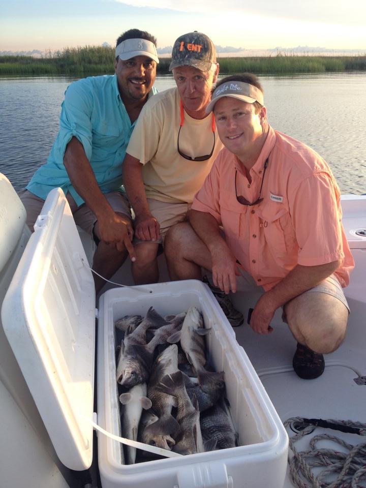 Some of the KDB Team with their catch on the annual fishing trip. 
