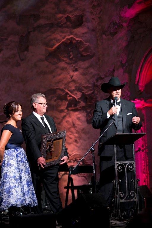 Mission Executive Director, Mechelle Lawrence Adams, and Mission Preservation Foundation President George O'Connell, recognize El Viaje de Portola President, Tony Gregory, in their support of Mission preservation efforts at Romance of the Mission benefit gala.